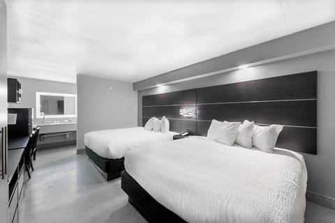 Suite, Multiple Beds, Non Smoking | Pillowtop beds, desk, iron/ironing board, free cribs/infant beds