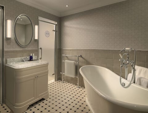 Luxury Suite, 1 King Bed, Garden View | Bathroom | Designer toiletries, hair dryer, bathrobes, slippers
