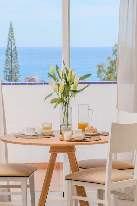 Premium bedding, memory foam beds, in-room safe, laptop workspace