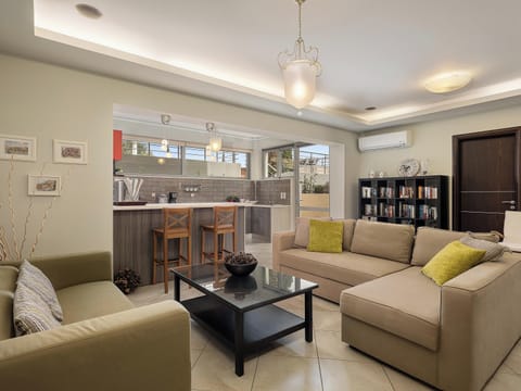 Family Villa, 3 Bedrooms, Sea View | Living area | 55-inch Smart TV with satellite channels, fireplace