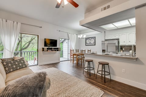 View of relaxing living room. Lots of seating w/ sleeper sofa, and loveseat, bar