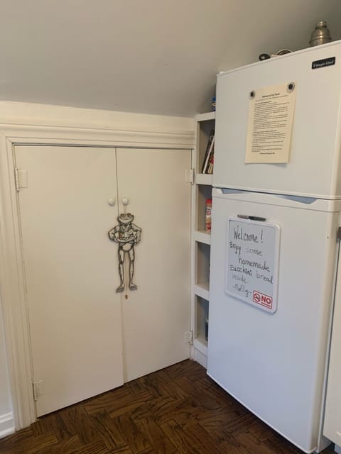 Kitchen pantry with pull-out extra workspace and kitchen small appliances. 