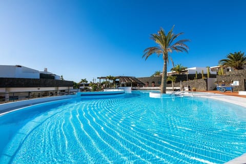 Outdoor pool, open 11:00 AM to 5:00 PM, pool umbrellas, sun loungers
