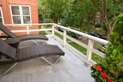 Relax on the spacious balcony overlooking our quiet residential street.