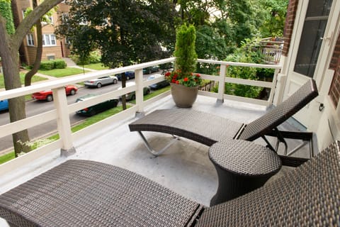 Relax on the spacious balcony overlooking our quiet residential street.