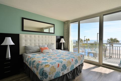 Master bedroom with ocean front balcony 