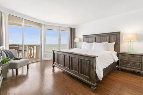 The large master suite has a king-size bed for your comfort. 
