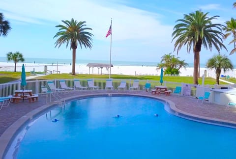 The private beach area is a brief walk from one of the three pools.