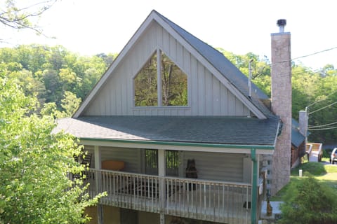 Cabin view from parking spaces, cabin is next to last cabin going down hill