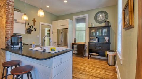Spacious kitchen will all you need to make a banquet or warm leftovers