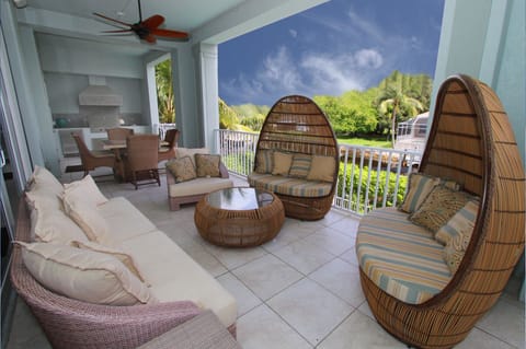 lanai area overlooking pool and saltwater canal 