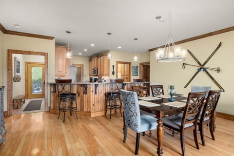 View of entry way and dining, kitchen areas