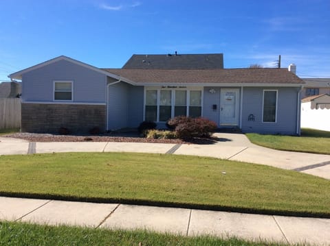 Front of house - 1/2 circular driveway. Fits 2-3 cars and plenty of street pkg.