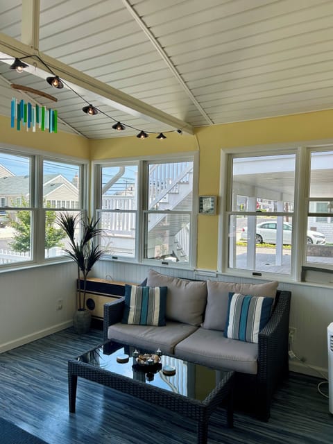 Spacious and bright front porch with Work station