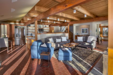 View of the living area kitchen and wet bar.