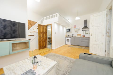 Superior Suite, 1 Bedroom, Kitchenette | Living area | Flat-screen TV, pay movies