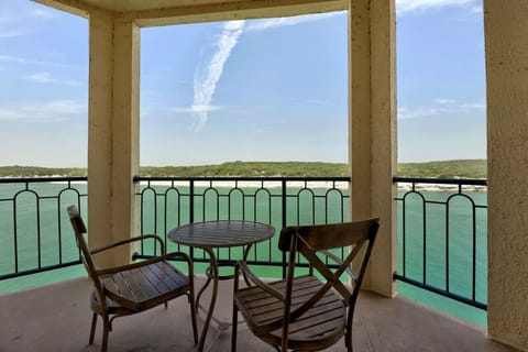 Sunrise coffee with 180° Lake Travis views from your private Lago Vista balcony.