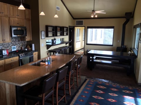 Seating for 15 in this nice entertaining space.  Opens to more seating on deck!