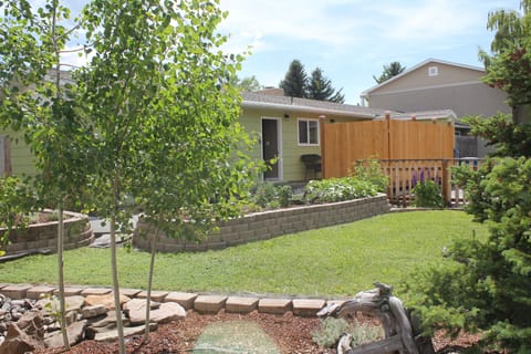 View of front yard from sidewalk on east side of rental.