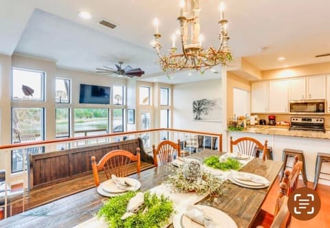 Spectacular dining views of the semiprivate lake and nature from the first floor