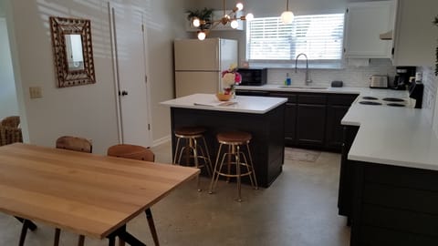 Large Open Concept Eat-In Kitchen with all you need to cook a meal.