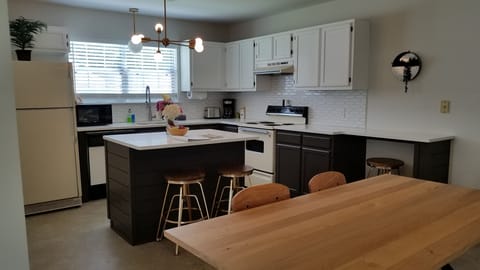 Large Open Concept Eat-In Kitchen with all you need to cook a meal.