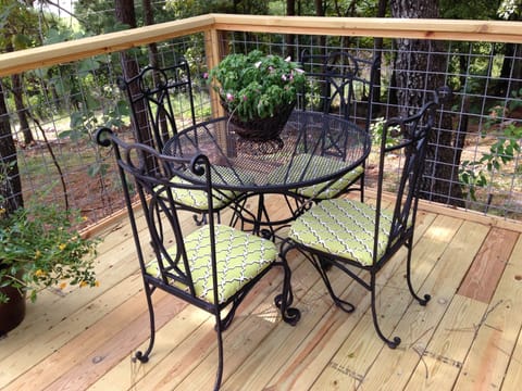 Deck table & chairs sit 4. Christmas lights can be plugged in all year long. 