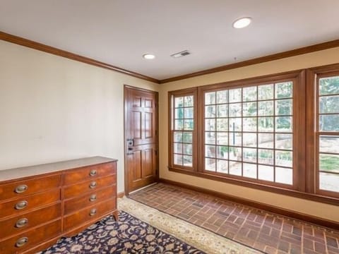 Pub/ game room. Goes out to screened in porch and outdoor patio