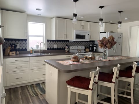 Enjoy our updated eat-in kitchen with everything you need to whip up a meal!