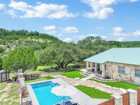 Newly remodeled yard with private pool, turf and putting green!
