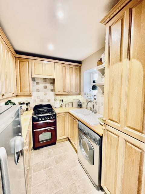 Fully fitted kitchen with washing machine & tumble handy for longer stays.
