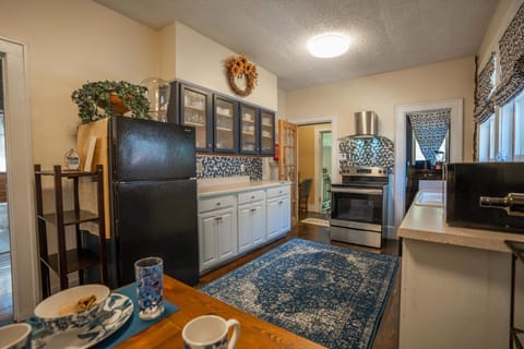 Kitchen includes appliance pantry, dishwasher,foil & plastic wrap & seated table