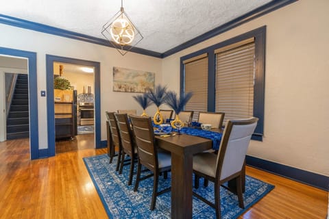 Dining area sits center of home open floor to living room or kitchen