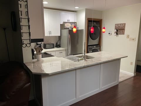 Keurig with few starter k-cups and electric kettle.