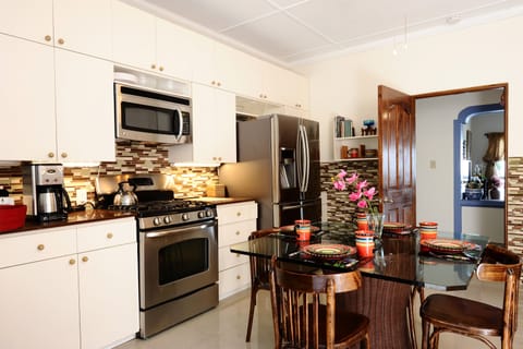 kitchen has all the modern  conveniences and appliances