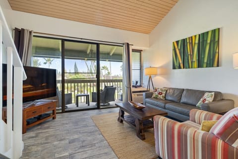 Bright living area opening to a breezy lanai for easy indoor-outdoor relaxing.