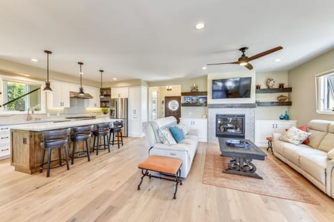 Comfortable seating on dual reclining sofas for family game playing fun.