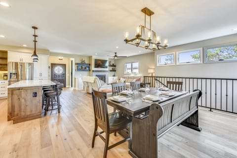 Dining table expands to seat 8-9 with 4 more at the island counter. 6 outside!!