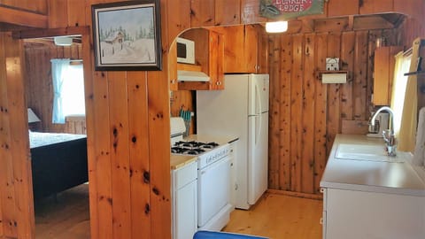 Full size kitchen is fully stocked with everything you need.