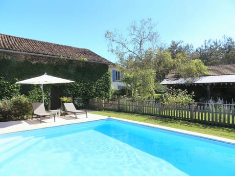 Solar-heated Pool in the peaceful rear gardens