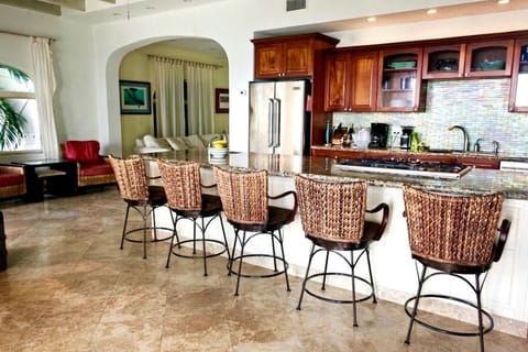 Three Palms Expansive Kitchen and Great Room is set up for entertaining.