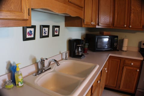 Clean, updated kitchen with ceramic sink, plenty of counter space
