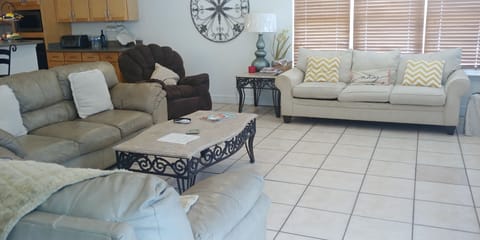 Living room sitting for 12 and sofa sleeper