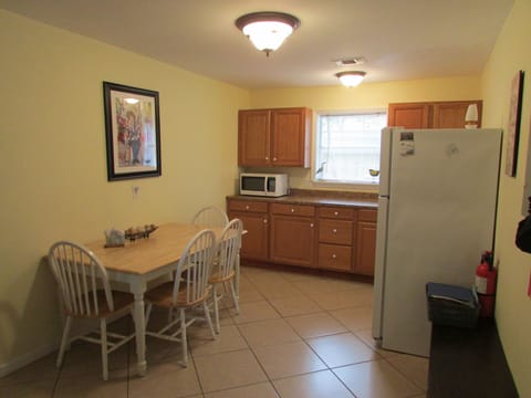 The other side of the kitchen and dining area.