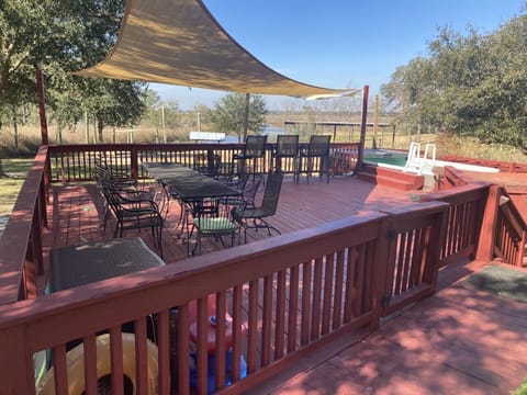 New deck with pool and hot tub at deck level.