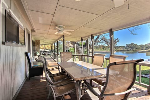 Wrap around porch with two tables to enjoy the view