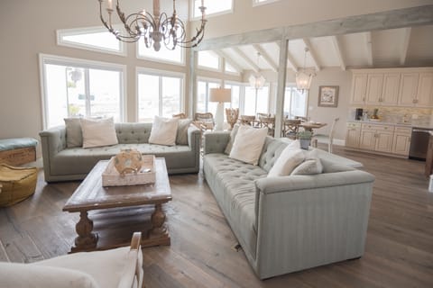 Enjoy stunning beach and ocean views from the living area, a wall of windows.  