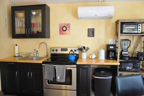 full kitchen, (with full size fridge -not seen to right )