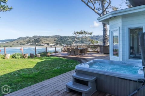 Hot Tub and backyard with views of Linda Mar beach and the open ocean