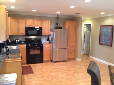 Large and bright kitchen with all new appliances and granite tile counter tops